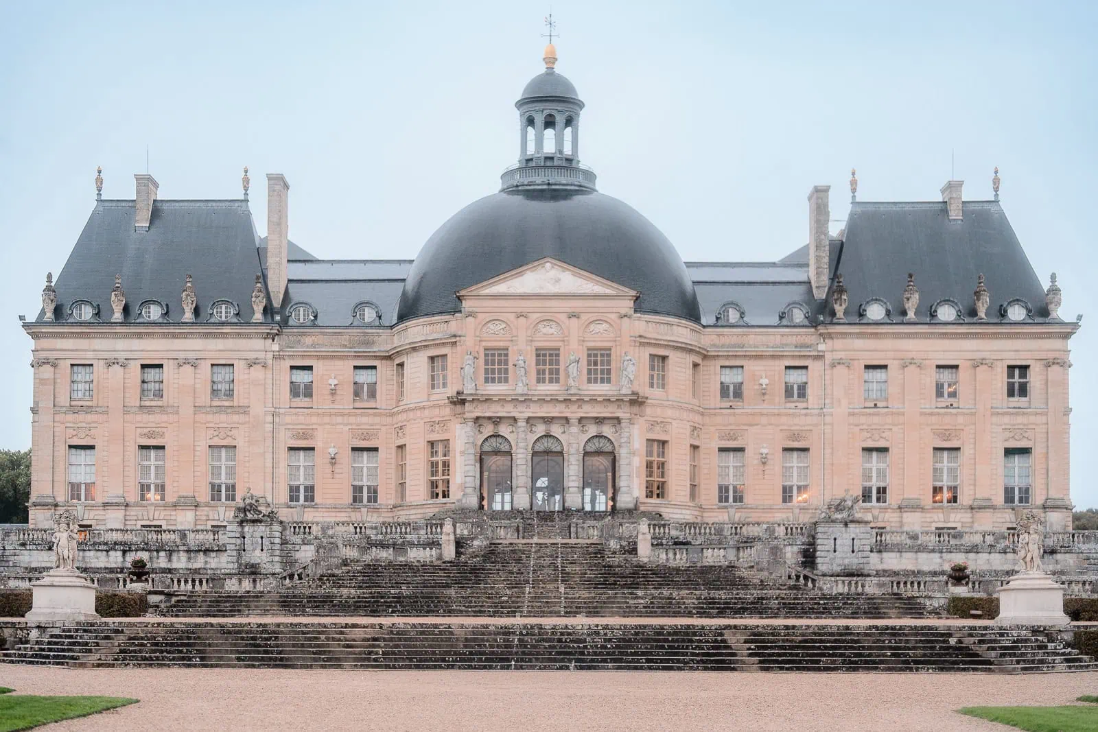 Chateau de Vaux-le-Vicomte exterior at dusk before our luxury proposal setup near Paris.