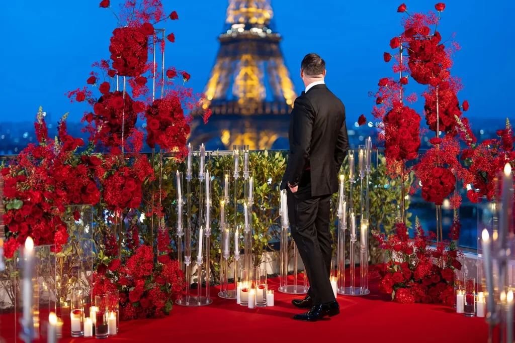Luxury Paris proposal package at Shangri-La terrace with Eiffel Tower view, red roses, and romantic setup by Kiss Me in Paris