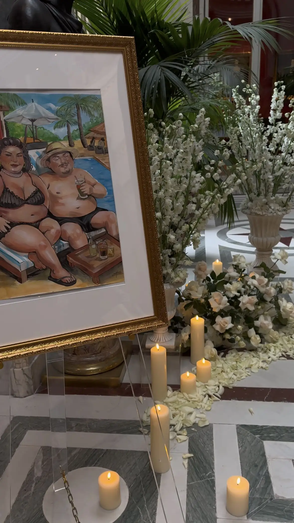 Behind-the-scenes candles and floral setup staged at Musée Jacquemart-André before a proposal