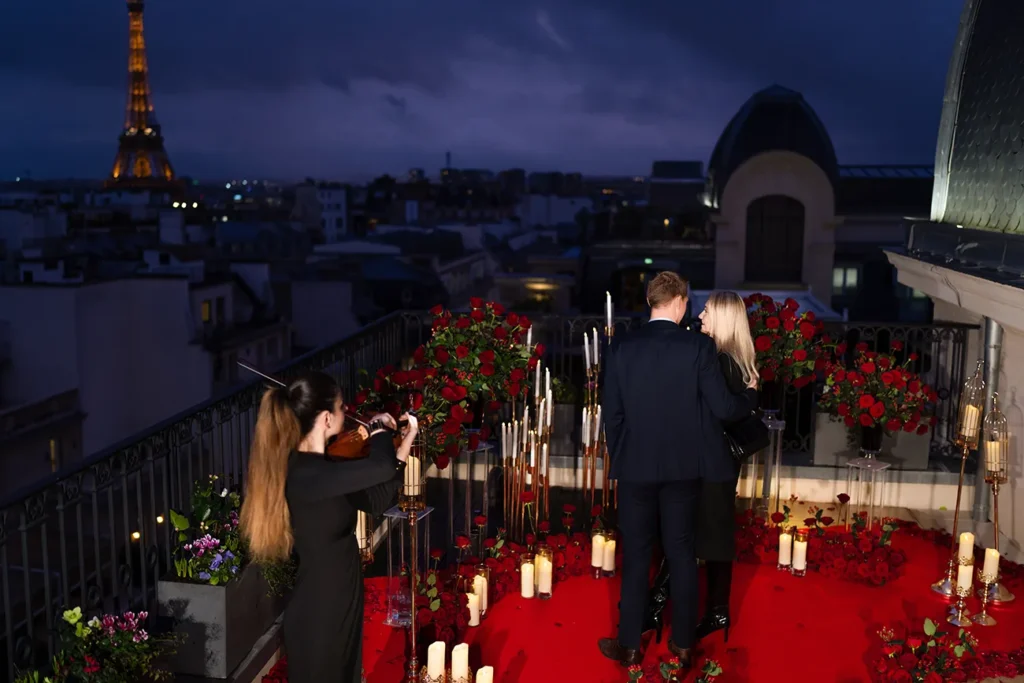 Marriage proposal on a rooftop at The Peninsula Paris with Eiffel Tower views